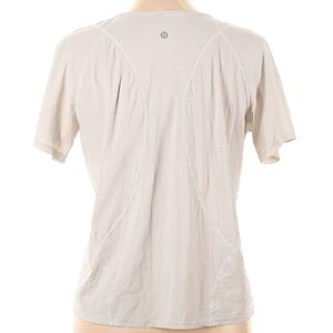 Used Lululemon Active T Shirt. Ivory/White. Size 12.